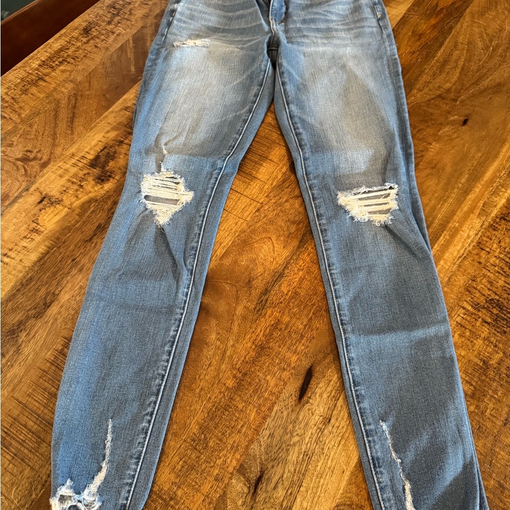 Distressed Blue Jeans